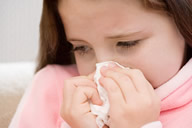 Girl Sneezing
